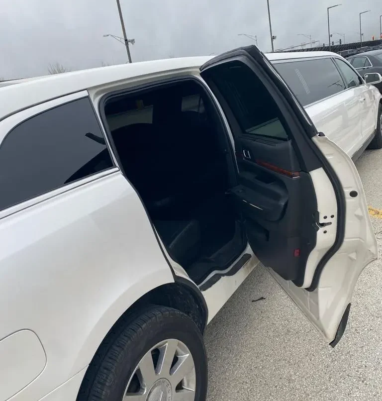 White Limo side parked