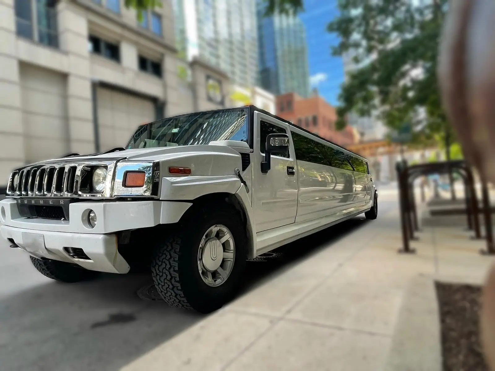 Hummer Limousine curbside pickup